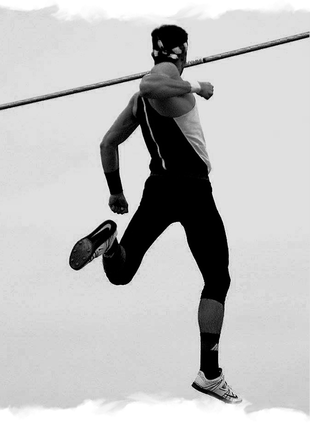 a woman is doing a high jump on a pole