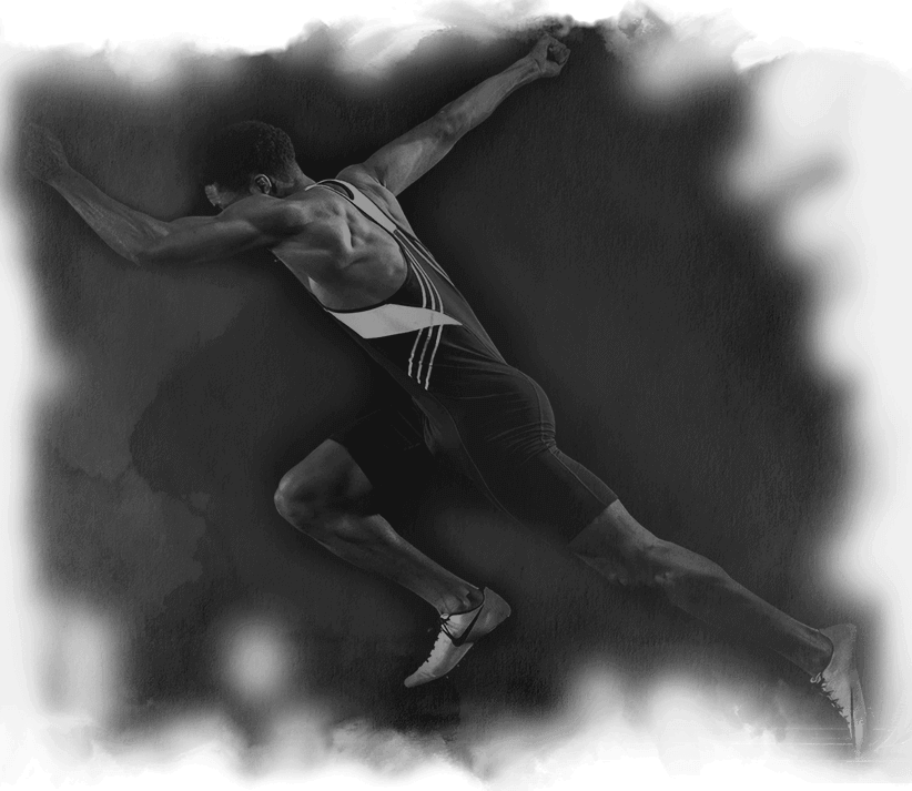 a black and white photo of a man jumping in the air