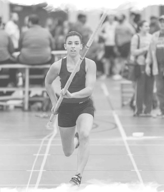 a woman is doing a high jump on a pole